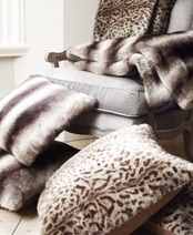 Designer cushions and luxury throws available to buy online with international delivery from Alexander Interiors Ltd.